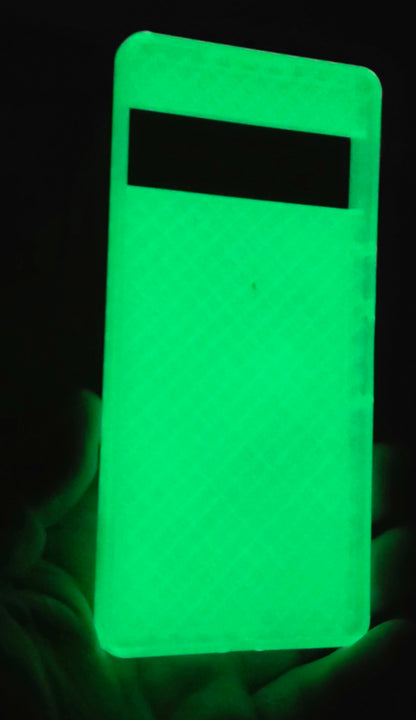 Glowing green phone case on a dark background